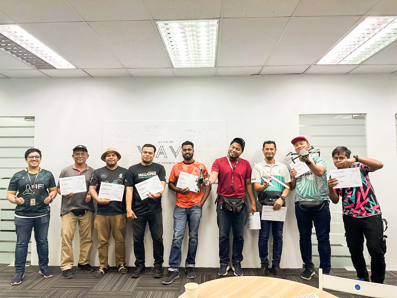 Students lined up with certificates